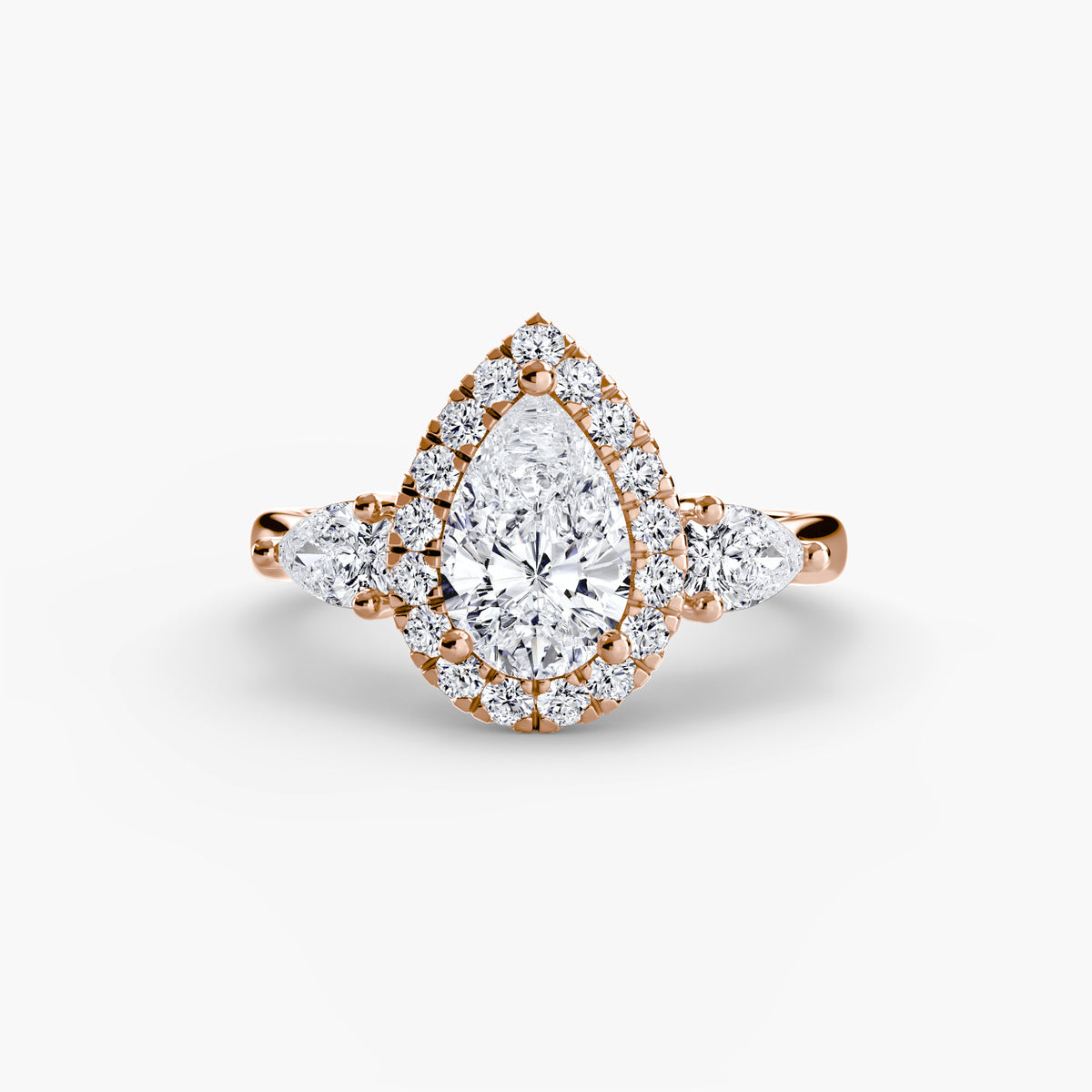 Bague Trois Pierres avec Halo
