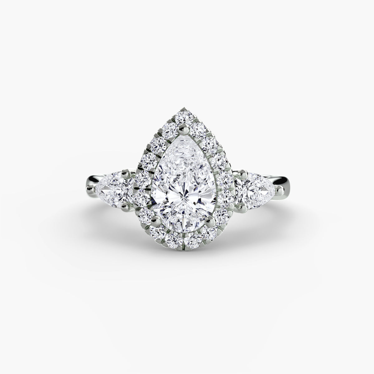 Bague Trois Pierres avec Halo