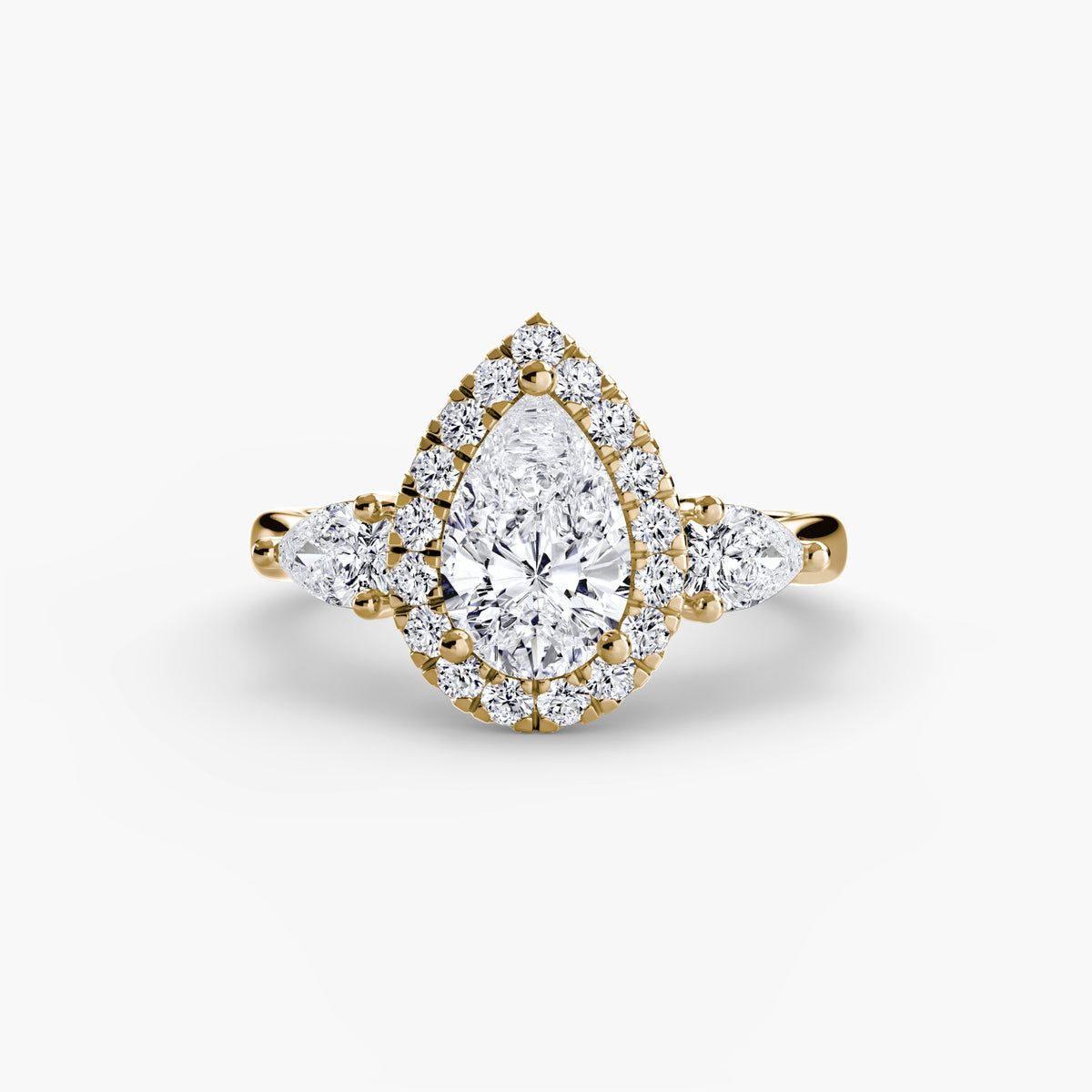 Bague Trois Pierres avec Halo